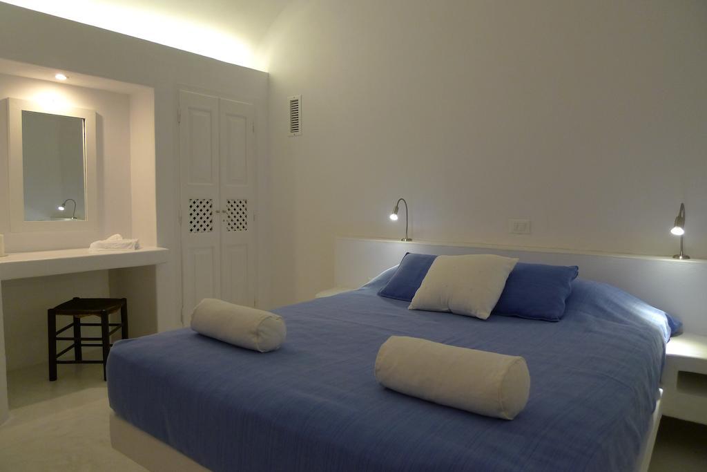 Altana Heritage Suites Imerovigli  Quarto foto